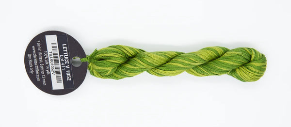 Braided green yarn with a label on a white background