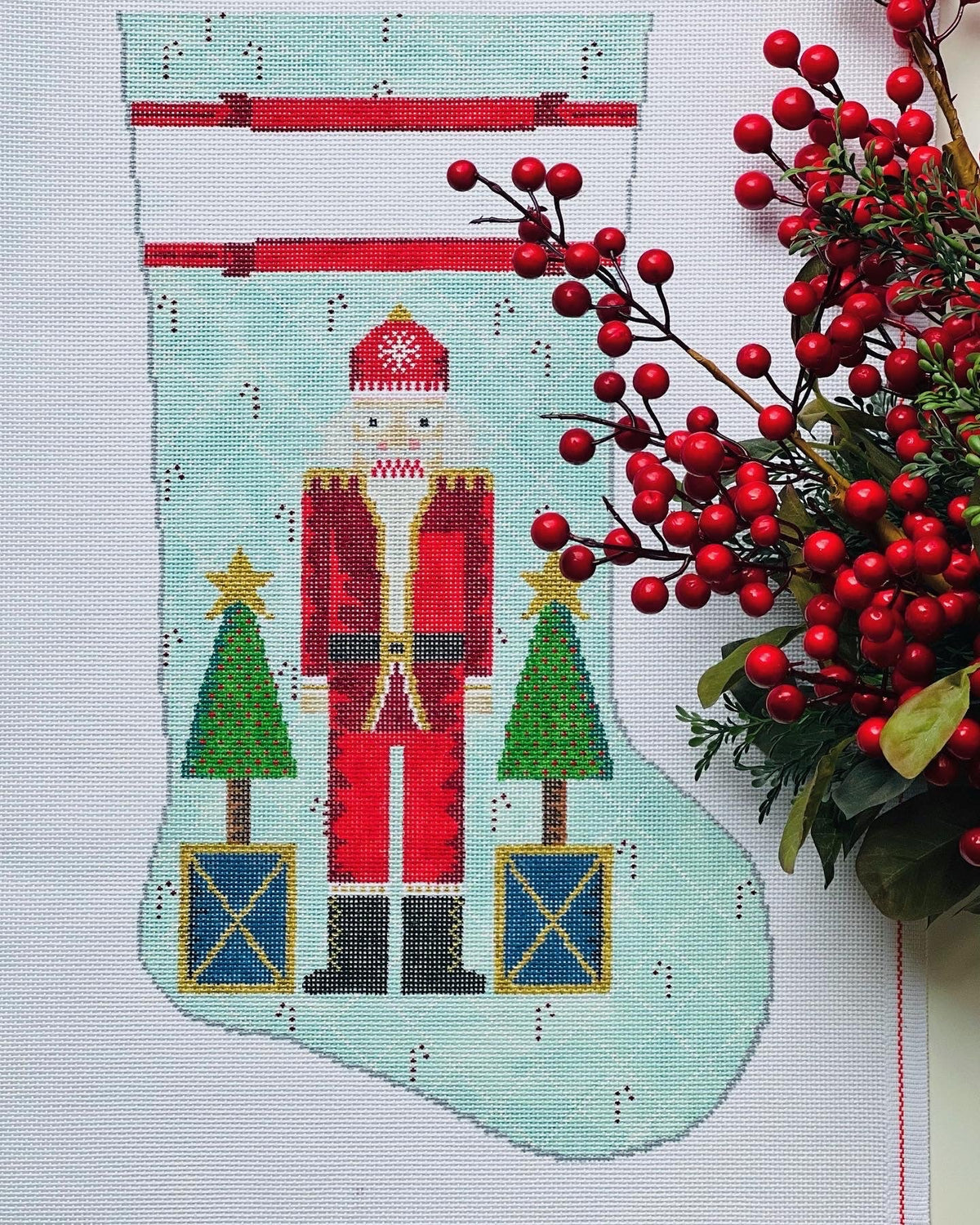 Santa Nutcracker with Stars on Blue Stocking
